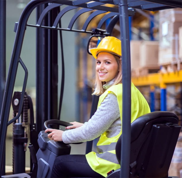 Warehouse worker on a forklift